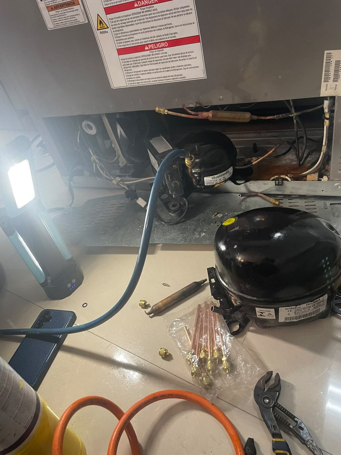 Compressor replacement carried out under work light